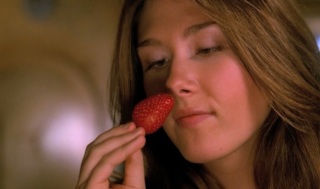 Kaylee eating a strawberry in Firefly.